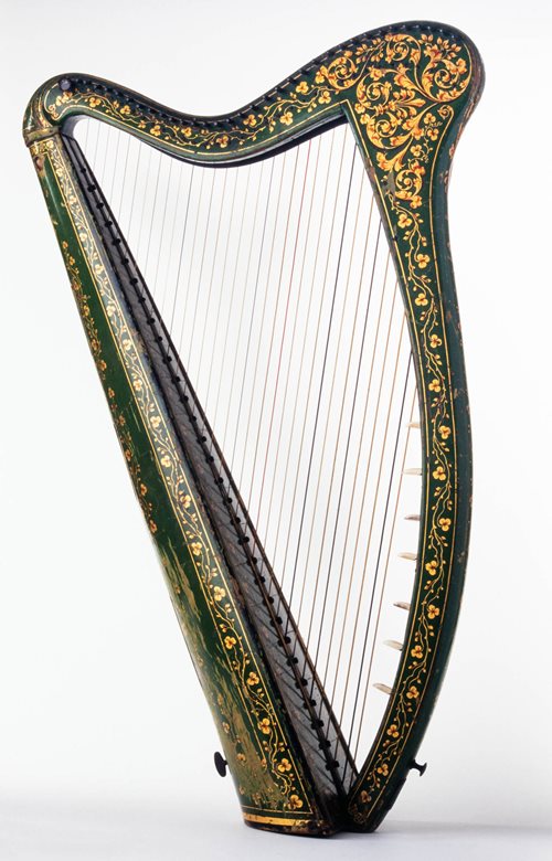 Green harp decorated with shamrocks